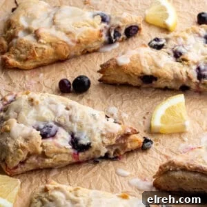 Flaky Sourdough Blueberry Scones Recipe 12 Scones with blueberries and a lemon glaze with fresh lemons and blueberries.