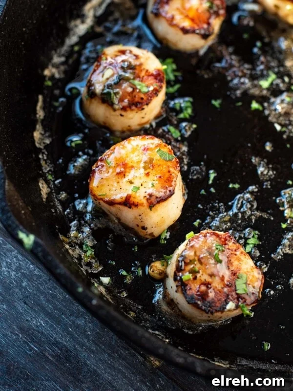 Sweet and Smoky Bacon Wrapped Scallops 11 Pan-seared scallops with lemon butter.