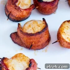 Sweet and Smoky Bacon Wrapped Scallops 14 Sweet and smoky bacon-wrapped scallops.