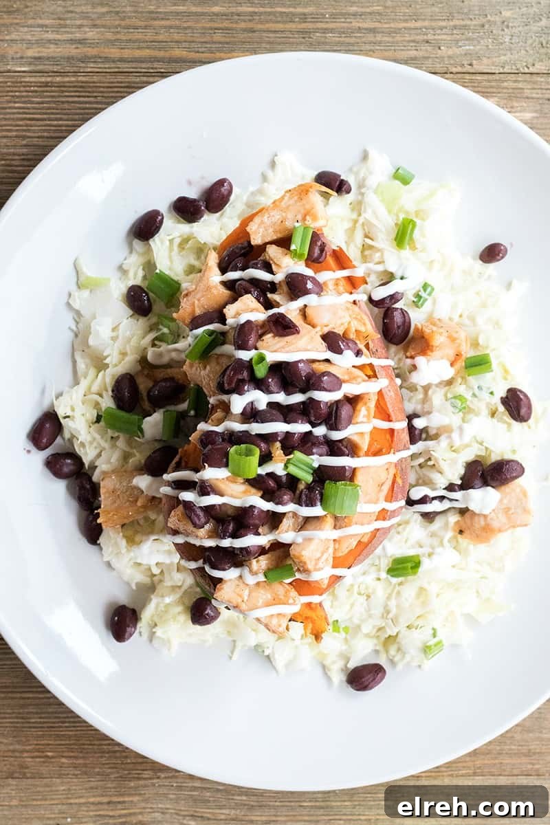 BBQ Chicken Stuffed Yams with Coleslaw is a healthy weeknight dinner that's loaded with flavor and is a sure-fire crowd pleaser!
