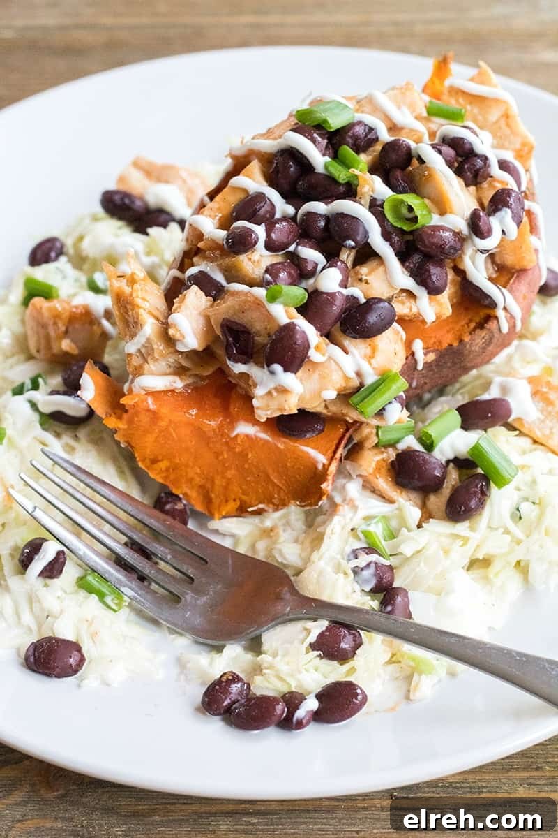 BBQ Chicken Stuffed Yams with Coleslaw is a healthy weeknight dinner that's loaded with flavor and is a sure-fire crowd pleaser!