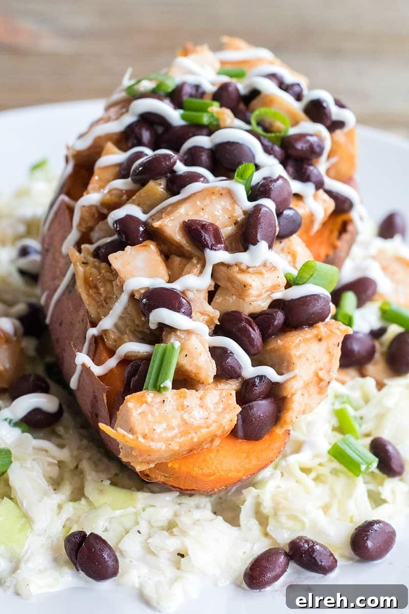 BBQ Chicken Stuffed Yams with Coleslaw is a healthy weeknight dinner that's loaded with flavor and is a sure-fire crowd pleaser!