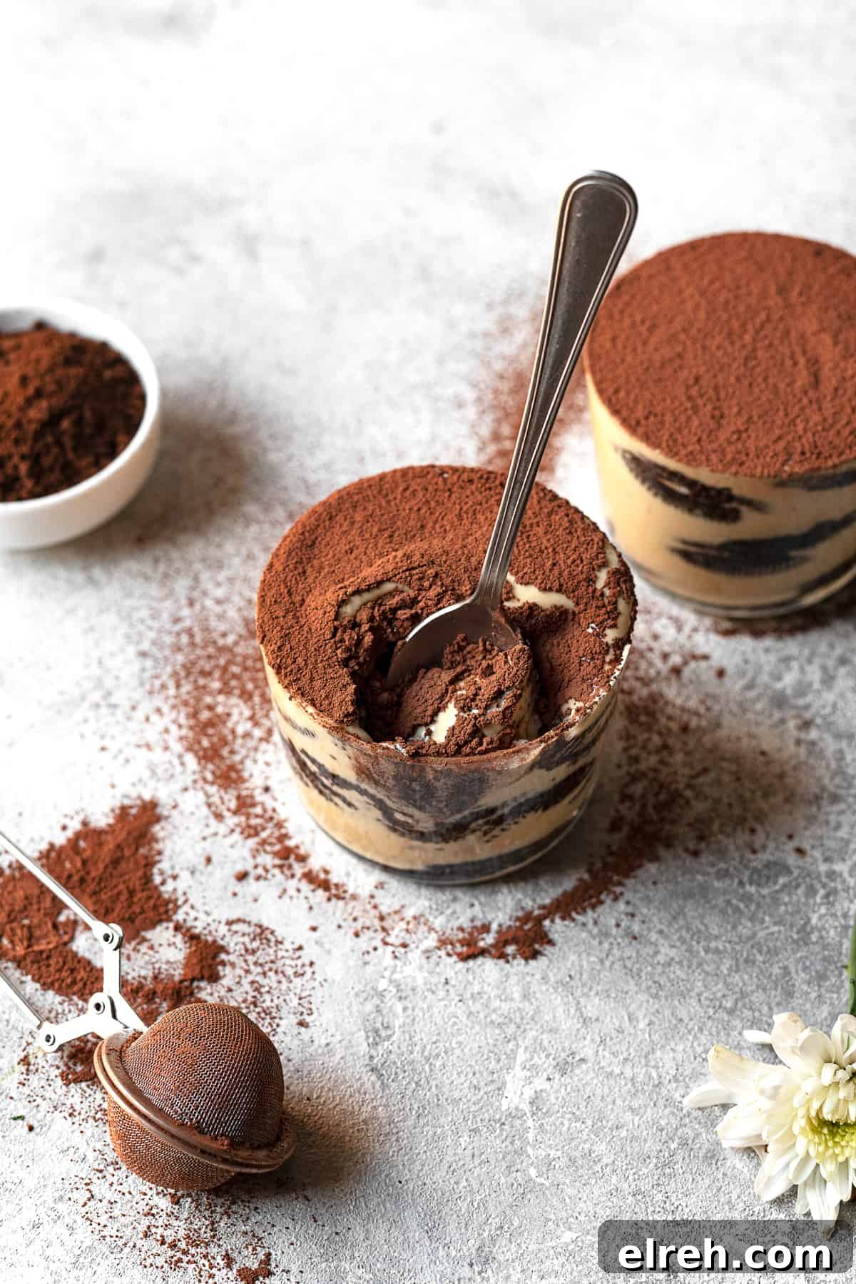 a spoon dipping into a jar of Oreo tiramisu