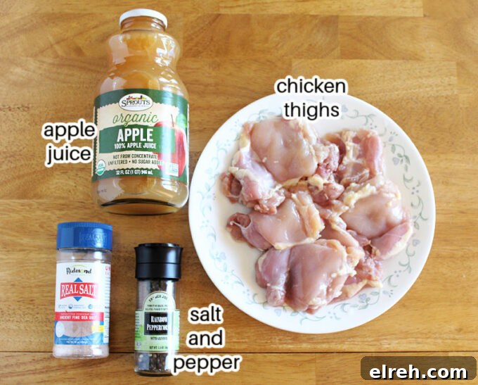 Apple Juice Glazed Chicken Thighs Recipe 3 Chicken, apple juice, salt, and pepper laid out on a table.