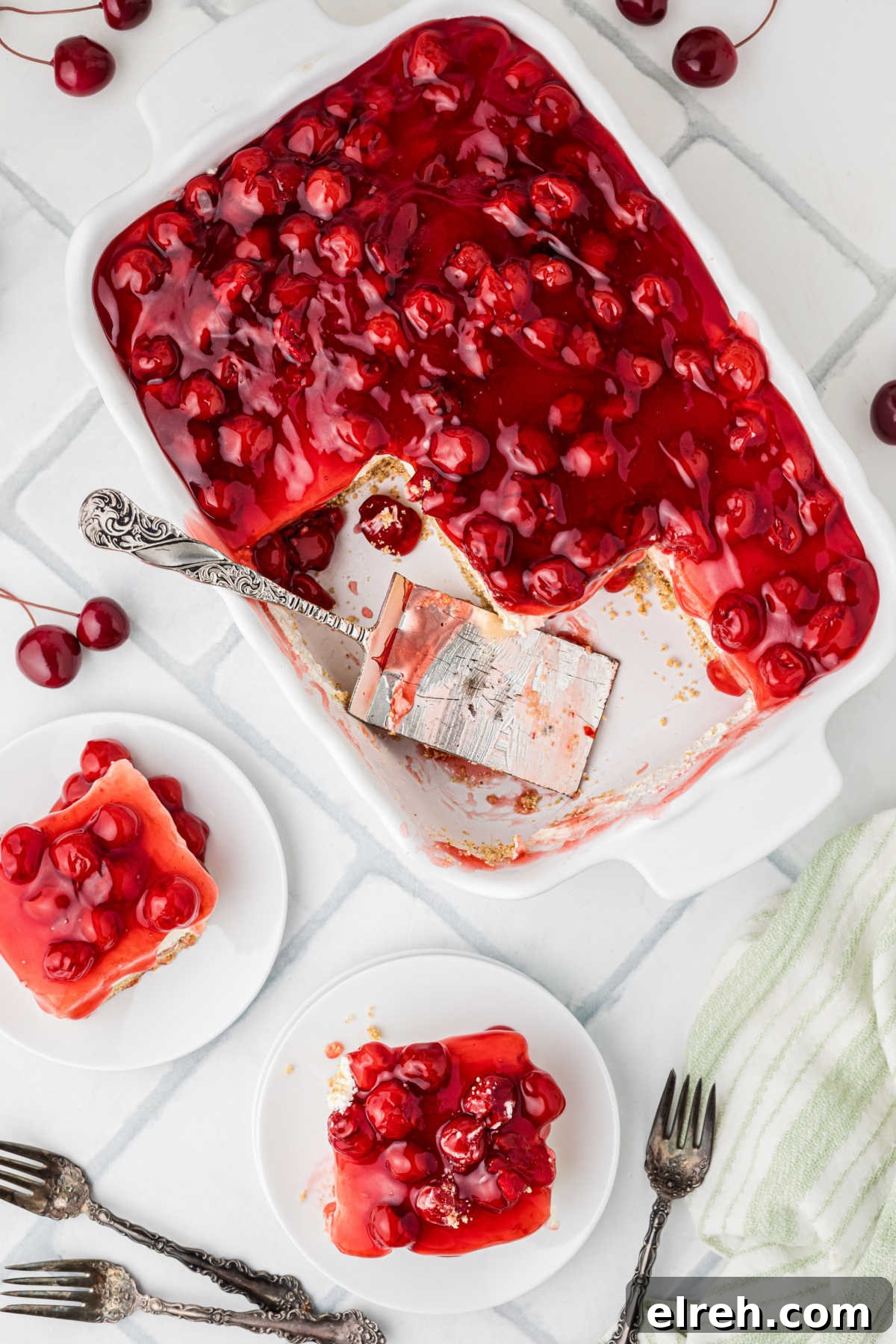 Overhead shot of a dish of old fashioned cherry delight, with some plated up.