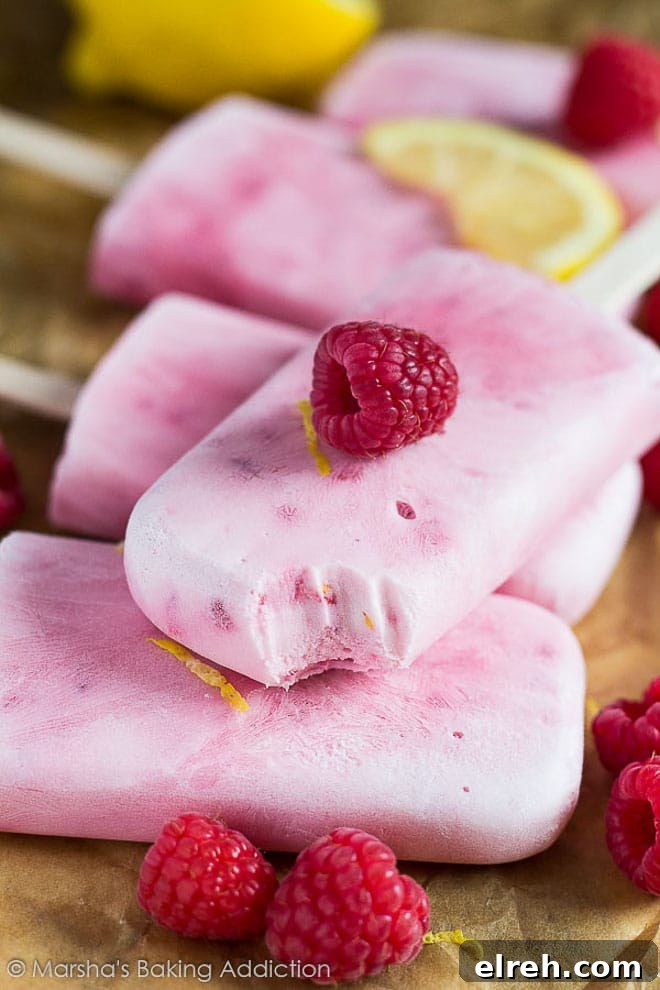 Raspberry lemon greek yogurt popsicles.
