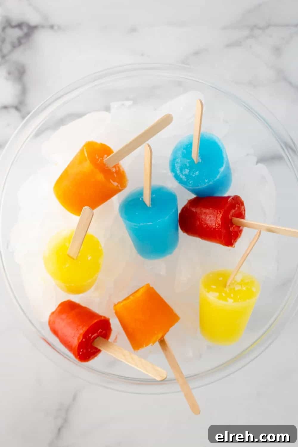 Jello popsicles in assorted colors.