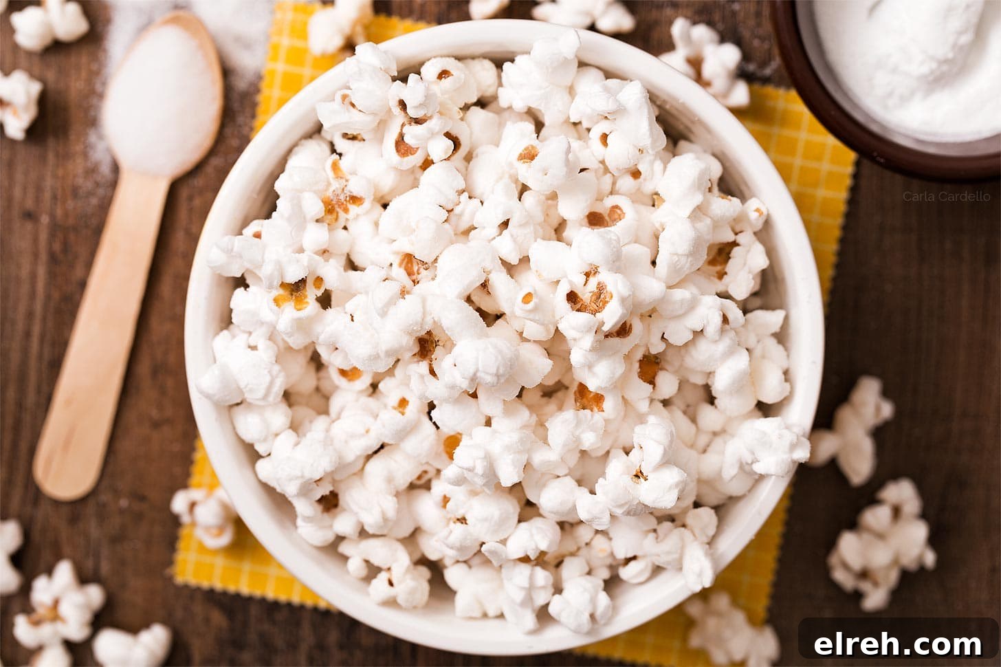 How to Make Salt and Vinegar Popcorn 4 Bowl full of salt and vinegar popcorn