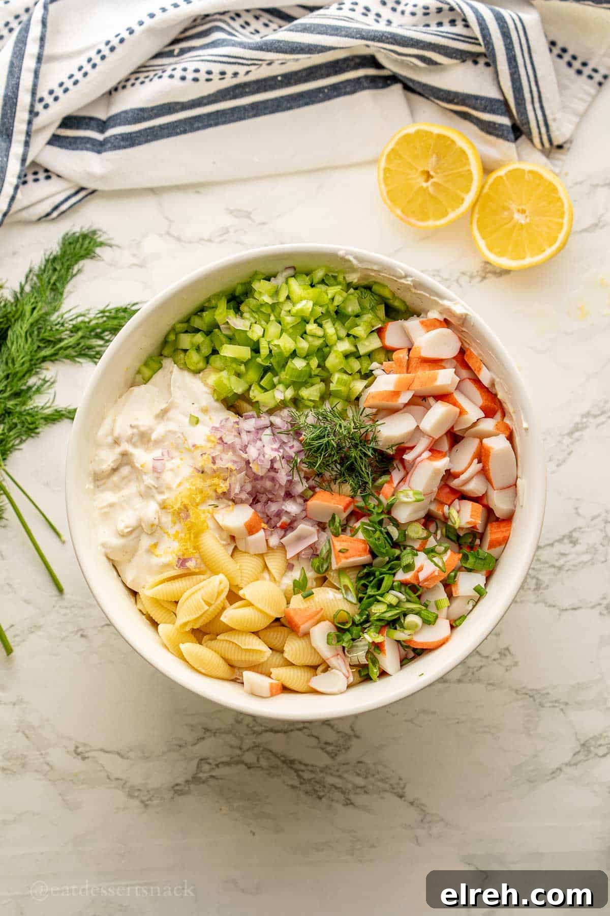 Creamy Crab and Pasta Salad with Lemon Dill Dressing 8 Crab Salad Ingredients in large bowl.