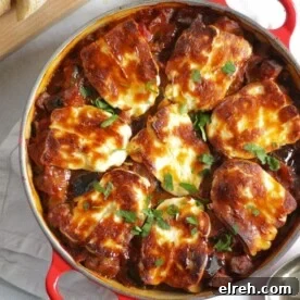 A large pot filled with cooked halloumi bake recipe.
