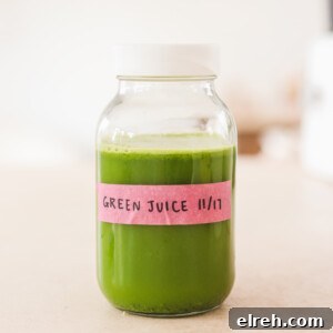Green Juice Recipe with Spinach, Cucumber, and Apple 2 Fresh homemade green juice with kale, celery, cucumber, pineapple, apple, mint, ginger, and lemon
