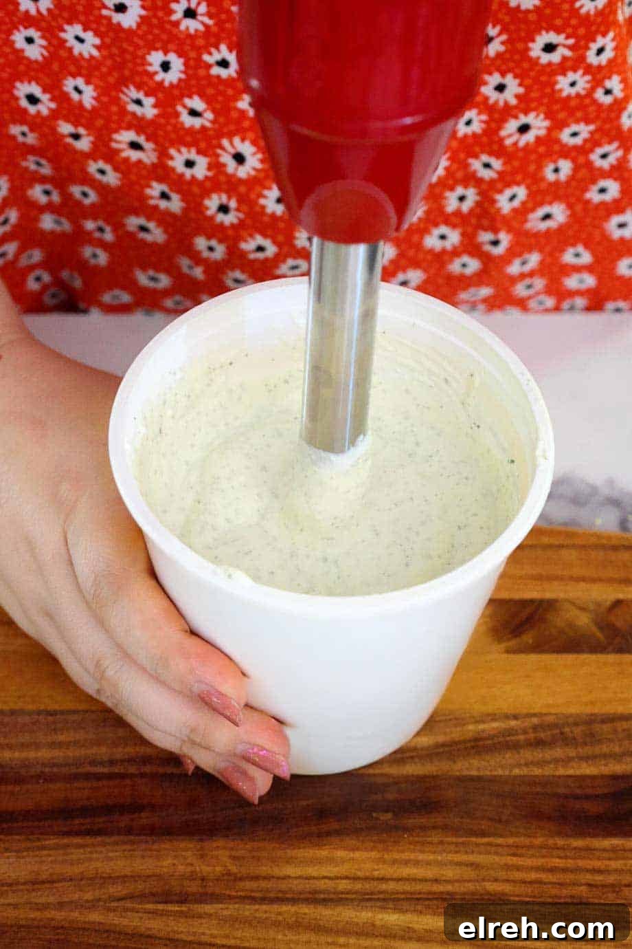 Cottage cheese ranch dip blended directly in the cottage cheese container with an immersion blender.