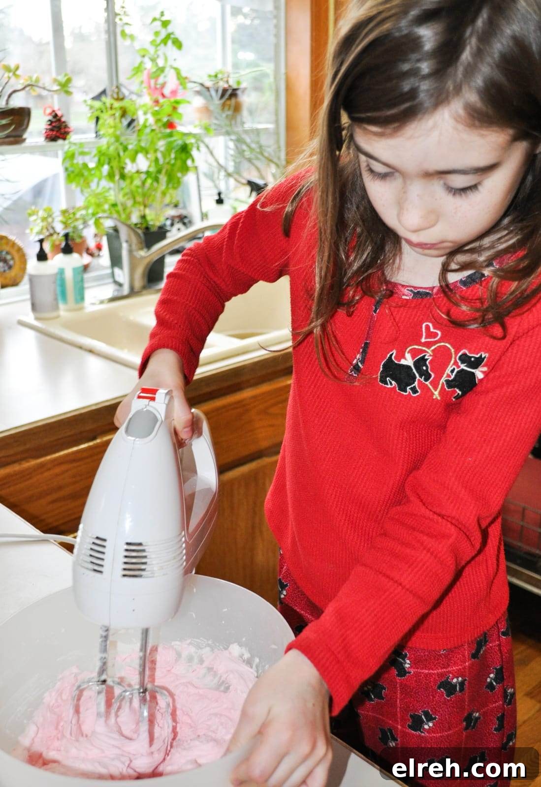 Mixing vanilla buttercream frosting