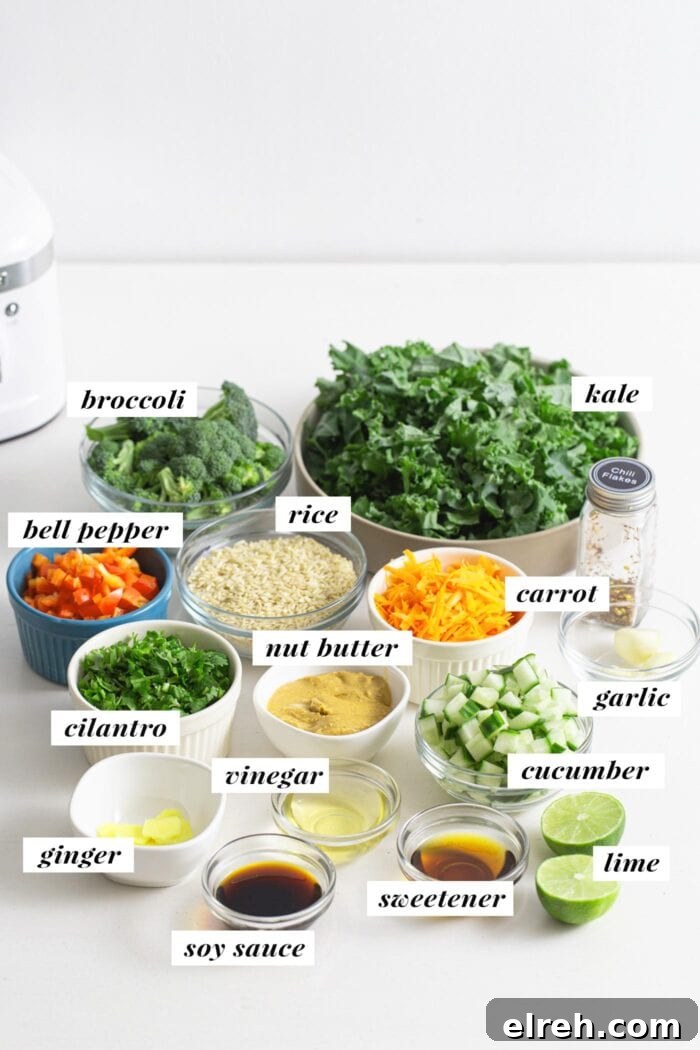 Visual of all ingredients for a broccoli, brown rice, and kale salad with peanut sauce. Ingredients are labelled with text overlay.