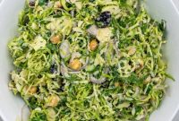 Shaved Brussels Sprouts Salad with Cranberries and Hazelnuts