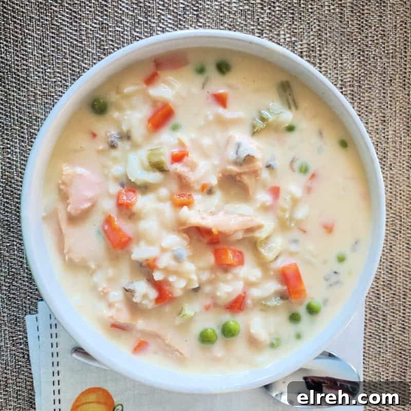 Celery Recipes Fresh Ideas for What to Make with Celery 21 Turkey wild rice soup in a white bowl next to a silver spoon and napkin