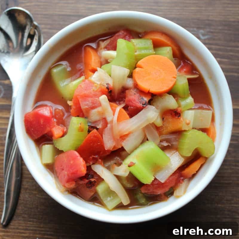 Celery Recipes Fresh Ideas for What to Make with Celery 7 WW Vegetable Soup with carrots, celery, onions, tomato, in a white bowl next to a spoon