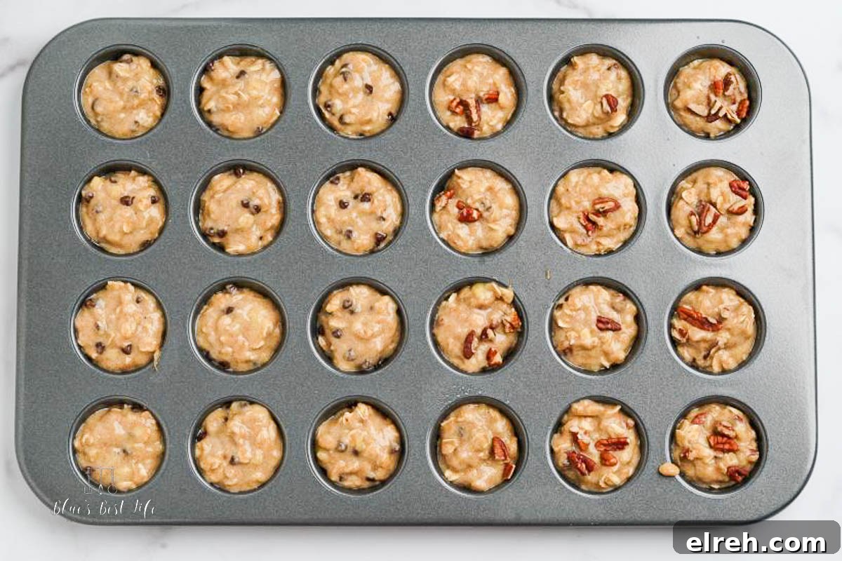 Muffin batter set in a muffin tin to be baked