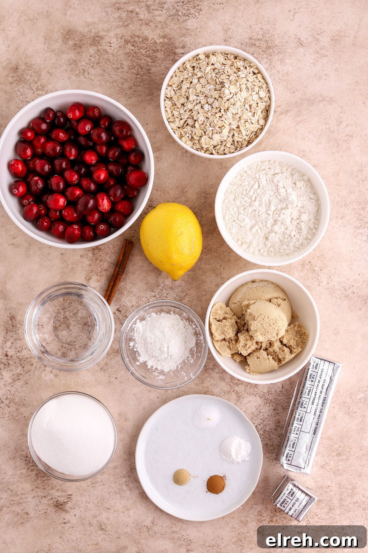 Tangy Cranberry Lemon Bars with Shortbread Crust 4 Ingredients for cranberry lemon bars on a counter.