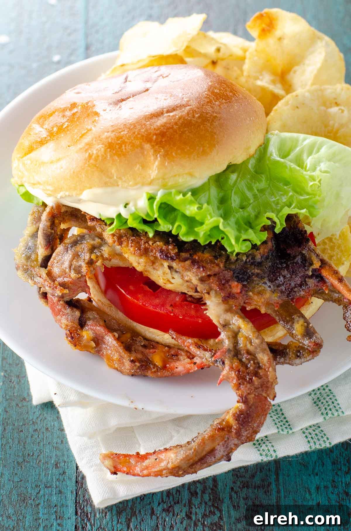 Soft-Shell Crab Sandwich Recipe: Crispy with Lemon Aioli 2 soft shell crab sandwich with lettuce, tomato, and mayo on a brioche bun