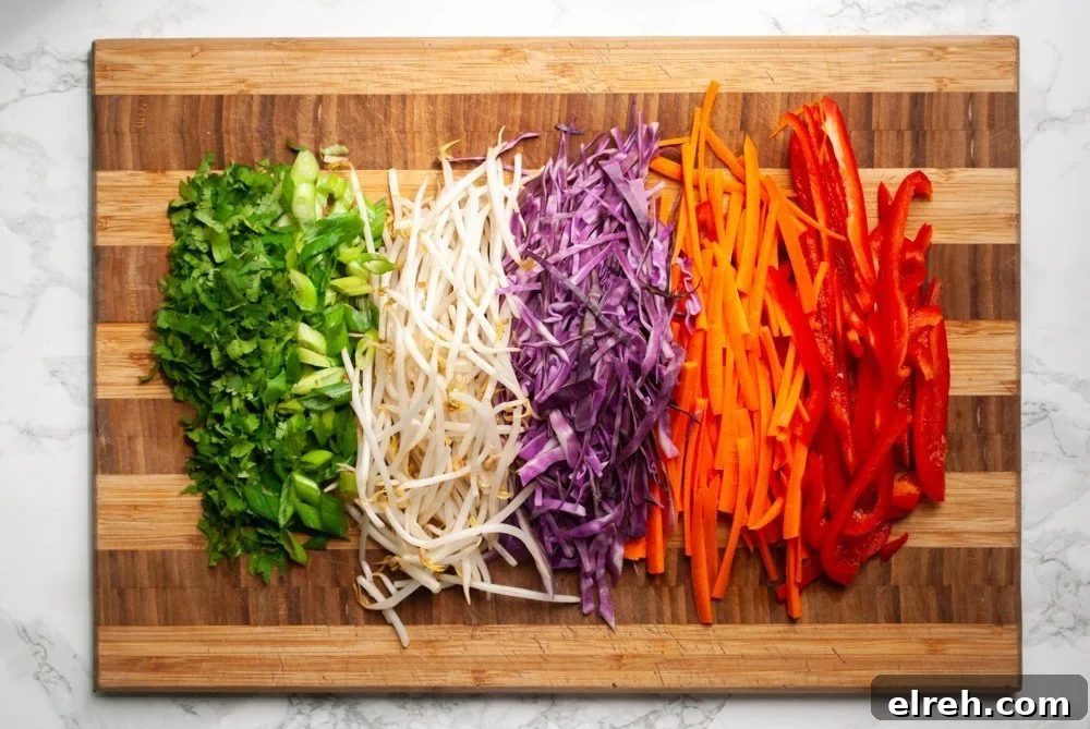chopped vegetables prepped on a cutting board