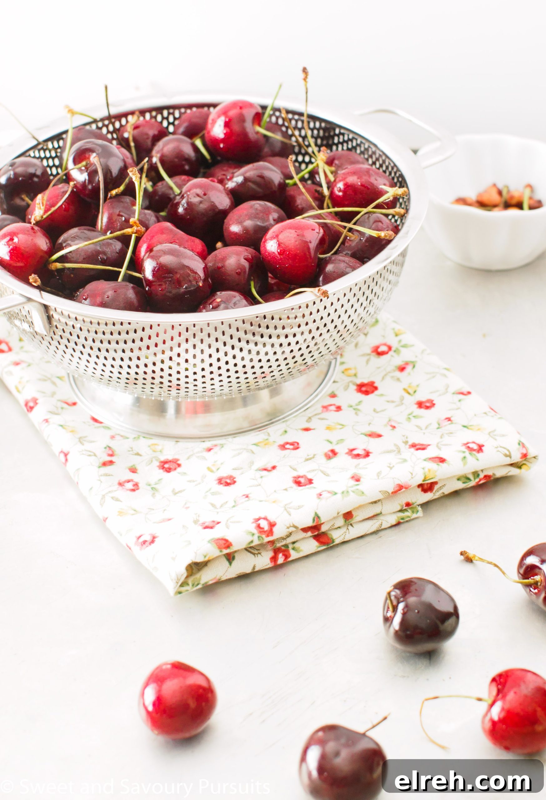 Irresistible Cherry Almond Cake with Fragrant Glaze 2 Colander full of freshly washed cherries.