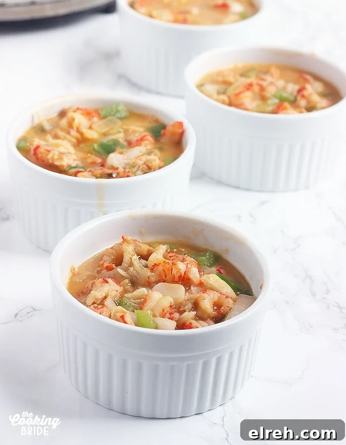 filling ramekins with crawfish filling