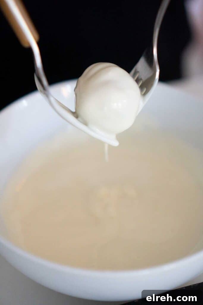 3 Ingredient Sugar Cookie Truffles 6 two forks holding truffle over bowl