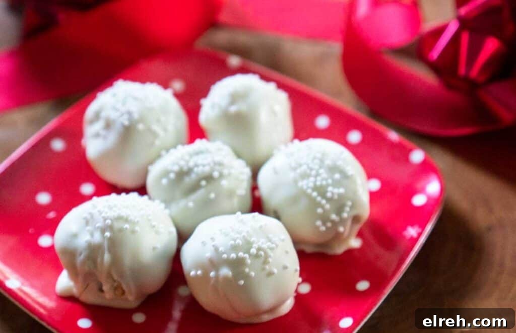 3 Ingredient Sugar Cookie Truffles 8 white chocolate truffles on red polka dot plate