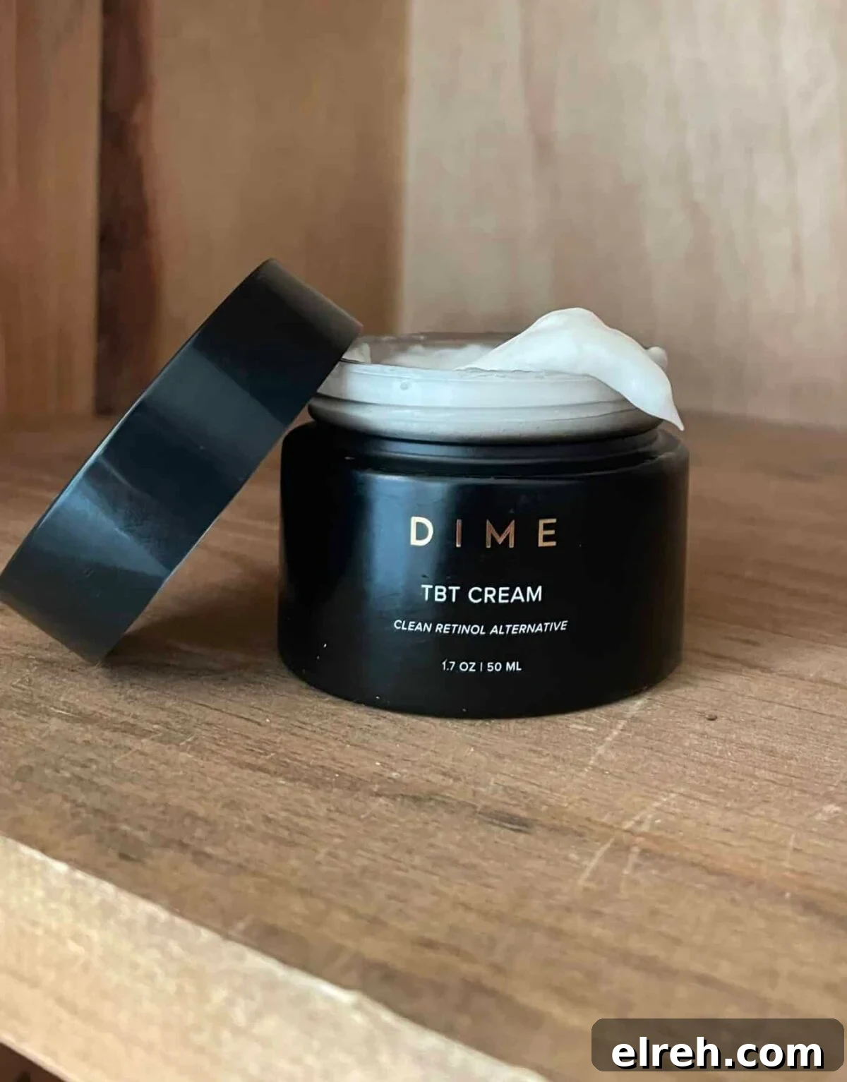 jar of dime tbt cream sitting on a shelf with the lid off