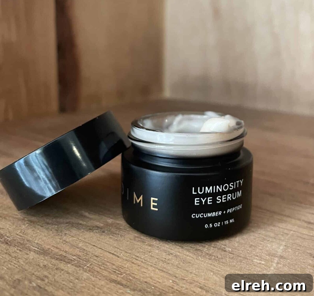a jar of dime eye serum with the lid off