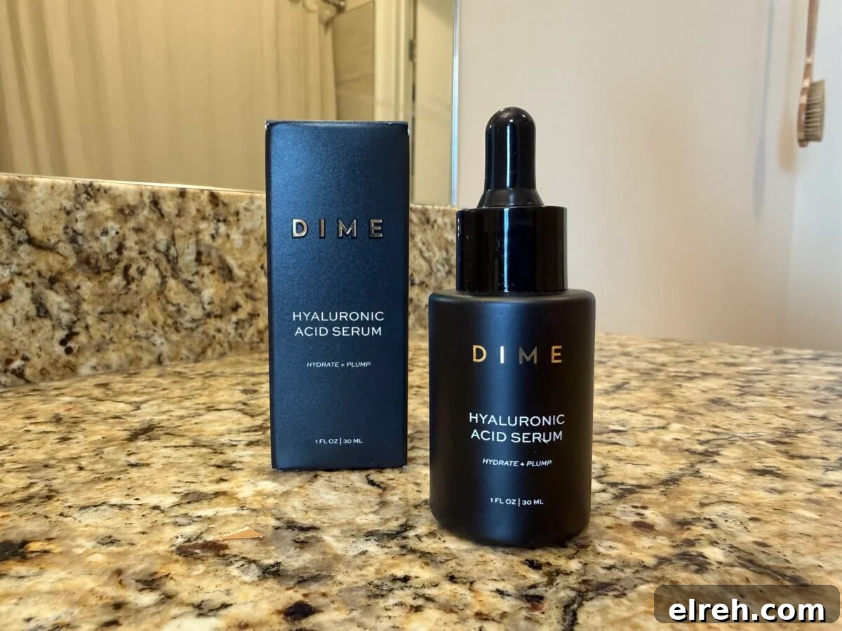 A black bottle of DIME Hyaluronic Acid Serum with a dropper