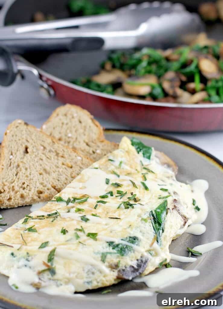 egg white omelet with vegetarian sausage, spinach, and mushroom
