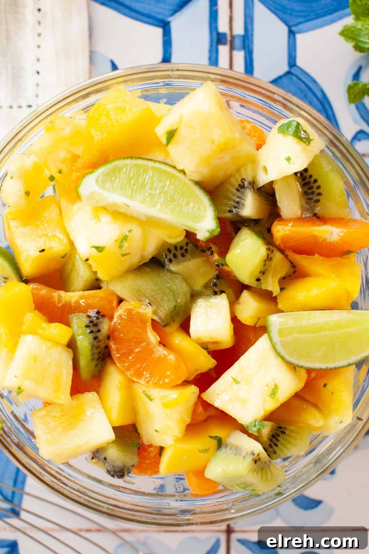 A bowl of Mexican fruit salad on a table.