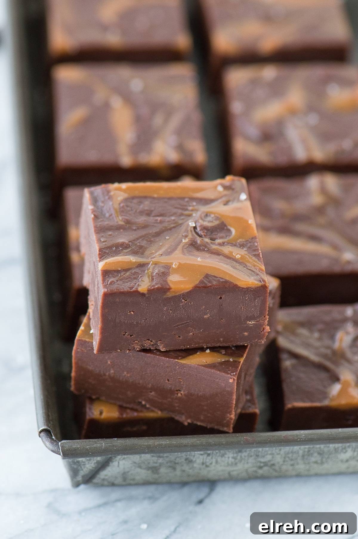 Creamy salted caramel mocha fudge cut into squares