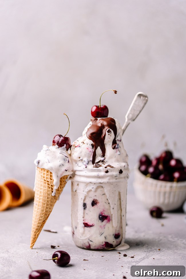 Cherry chocolate ice cream served in a waffle cone and a jar