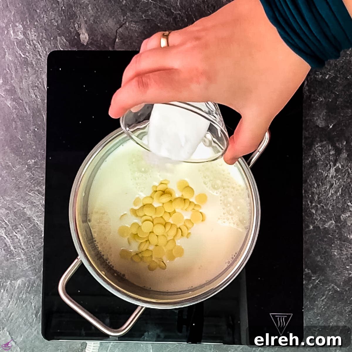 White Chocolate Pudding Recipe to Impress Guests 8 Add the sugar to the chocolate and milk mixture.