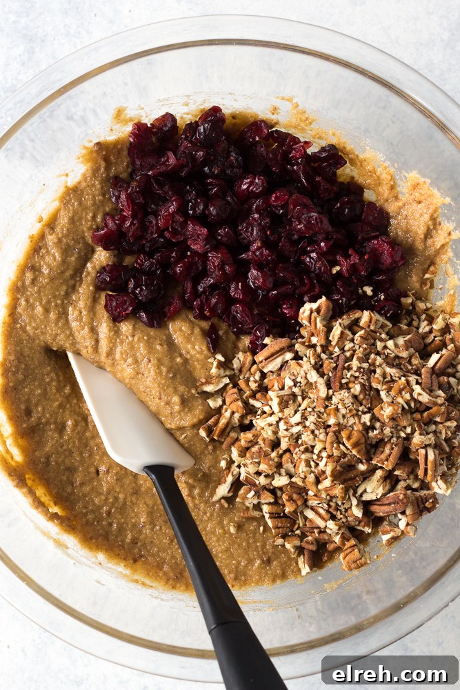 Grain-Free Sweet Potato Breakfast Cookies Recipe 4 sweet potato cookie batter with dried cranberries and pecans mixed in by Flora & Vino