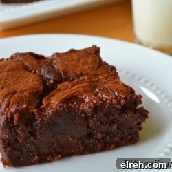 Butterscotch Brownie - In Square Shape on White Plate with Bourbon Butterscotch Swirl Throughout