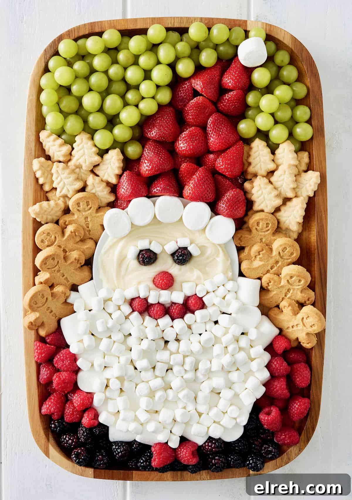 Throw an Ugly Sweater Holiday Party: Ideas and Tips 8 An assortment of festive sweets displayed on a board.