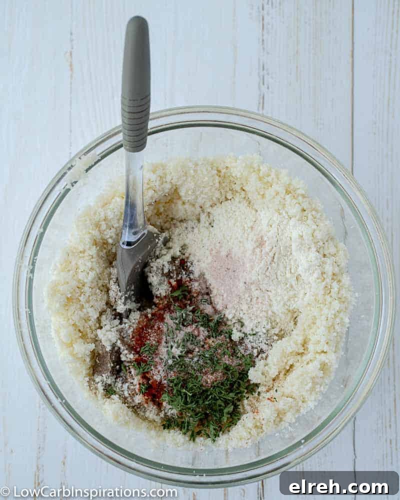 How to Make Mushroom Pizza with Cauliflower Crust 10 cauliflower pizza crust ingredients in a clear bowl with a spatula to mix