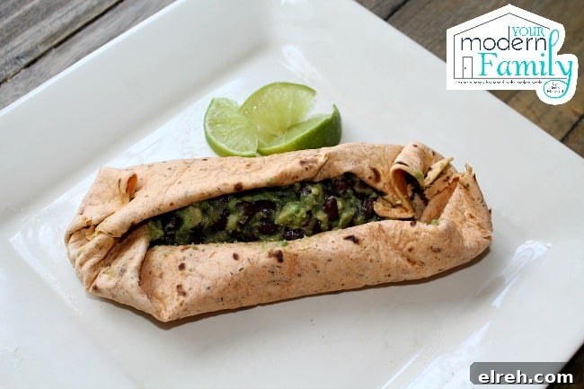 Cinco de Mayo Bread Recipes You'll Love 4 A sandwich sitting on top of a plate with limes beside it.