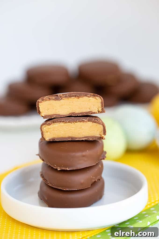 Chocolate Peanut Butter Eggs Recipe 6 stack of pb eggs with the top one cut in half