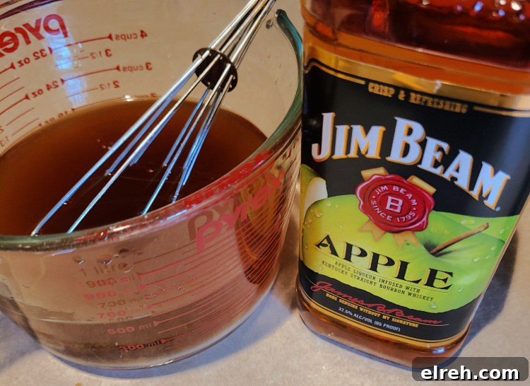 Jim Beam Apple Bourbon By Pryex measuring glass for mixing meat injection
