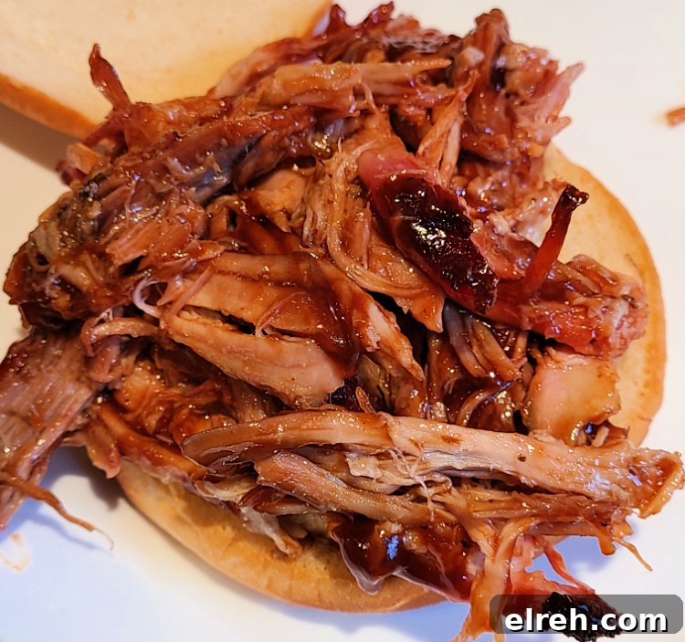 Jim Beam Apple Bourbon pulled pork served on a bun with bbq sauce