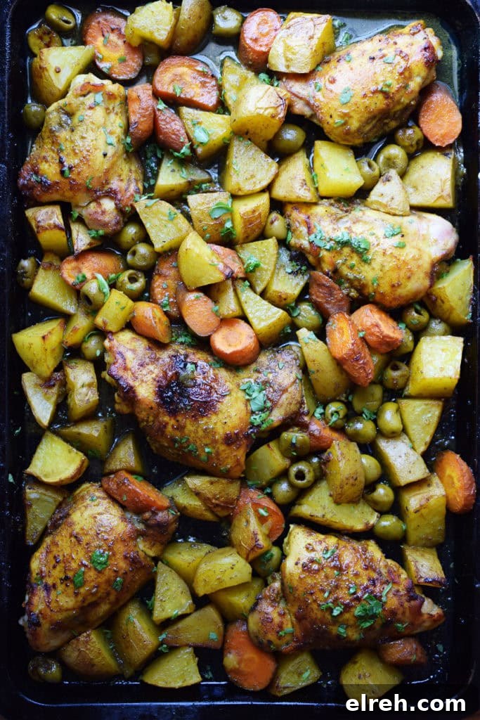 Sheet Pan Moroccan Chicken Dinner with Warm Spices 10 Moroccan sheet pan chicken dinner on a sheet pan.