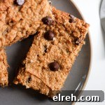 A healthy chocolate chip cookie bar on a grey plate.