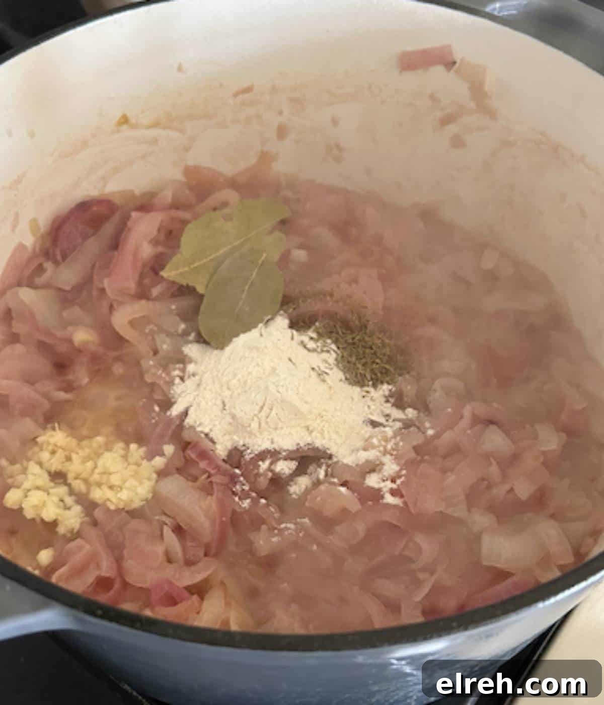Panera Copycat French Onion Soup Recipe - Bistro-Style 7 Onions with flour, bay leaf, and garlic.
