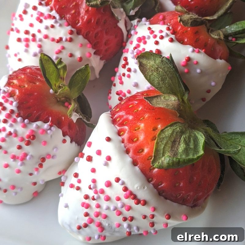 Strawberries dipped in white chocolate with Valentine's sprinkles