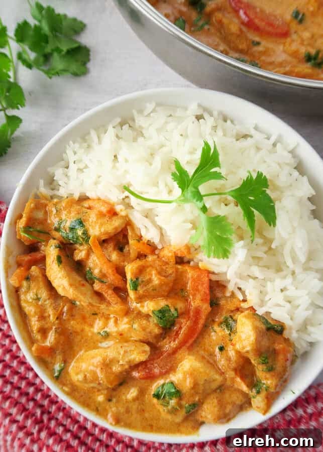 30-Minute One-Pot Thai Red Curry Chicken 11 a bowl of rice with Thai Red Curry Chicken